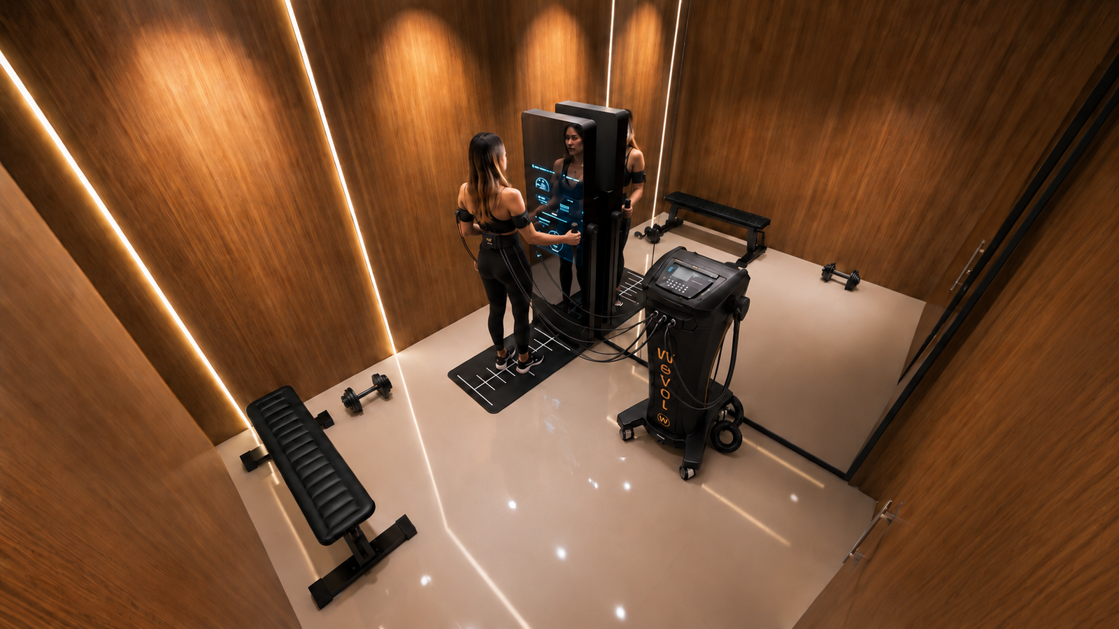 Sala WEVOL con una alumna conectada a los equipos de entrenamiento